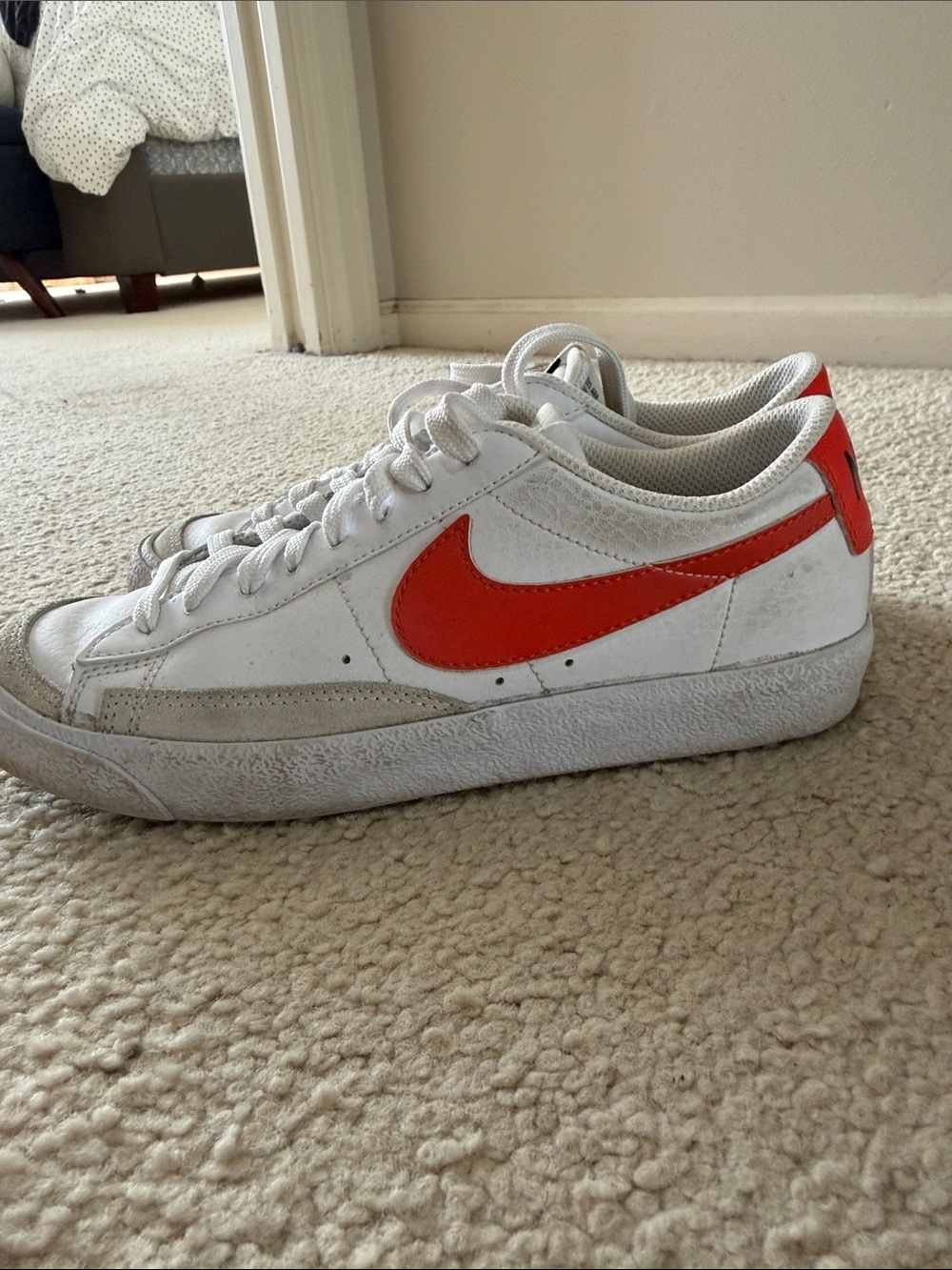 Nike White Leather Sneakers with Orange-Red Swoosh